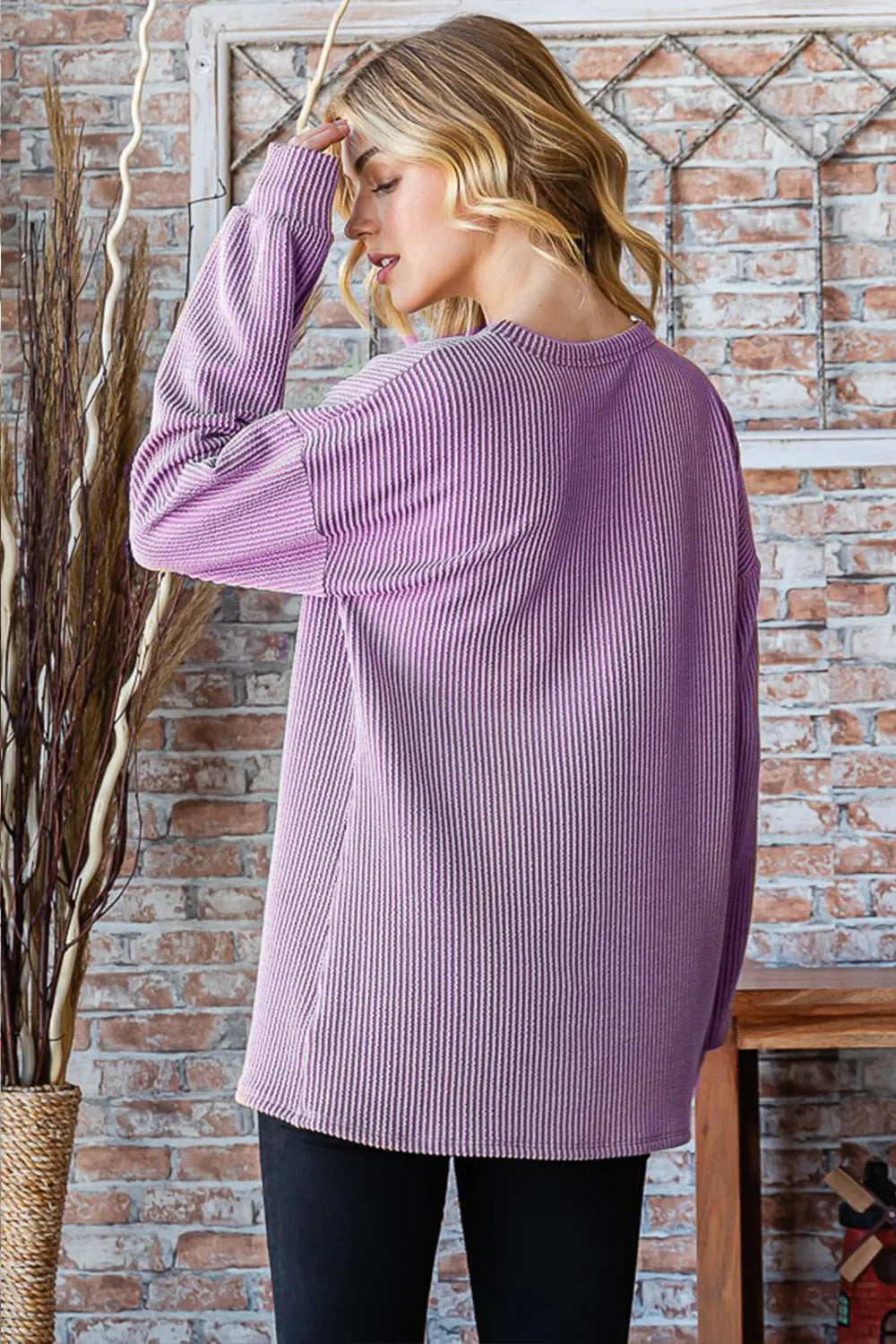 Heimish full size round neck dropped shoulder blouse in soft fabric, displayed on a hanger with a neutral background.