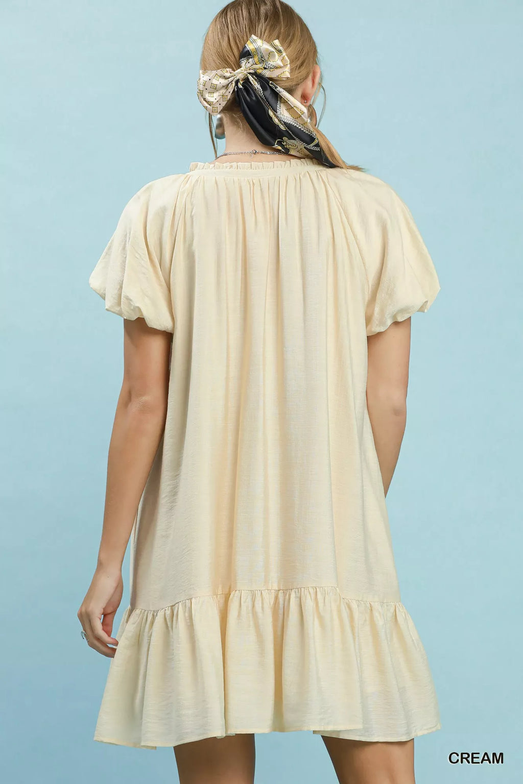 Umgee ruffle hem shift mini dress from Trendsi, featuring a stylish ruffled hem and sleeveless design, perfect for casual wear.
