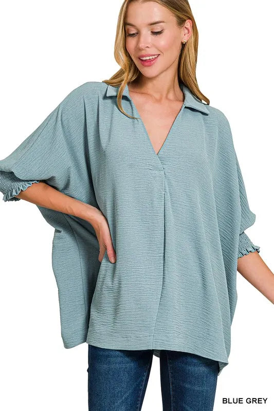 Zenana airflow collar tee with smocked sleeve band, featuring a relaxed fit and casual style, shown on a model.
