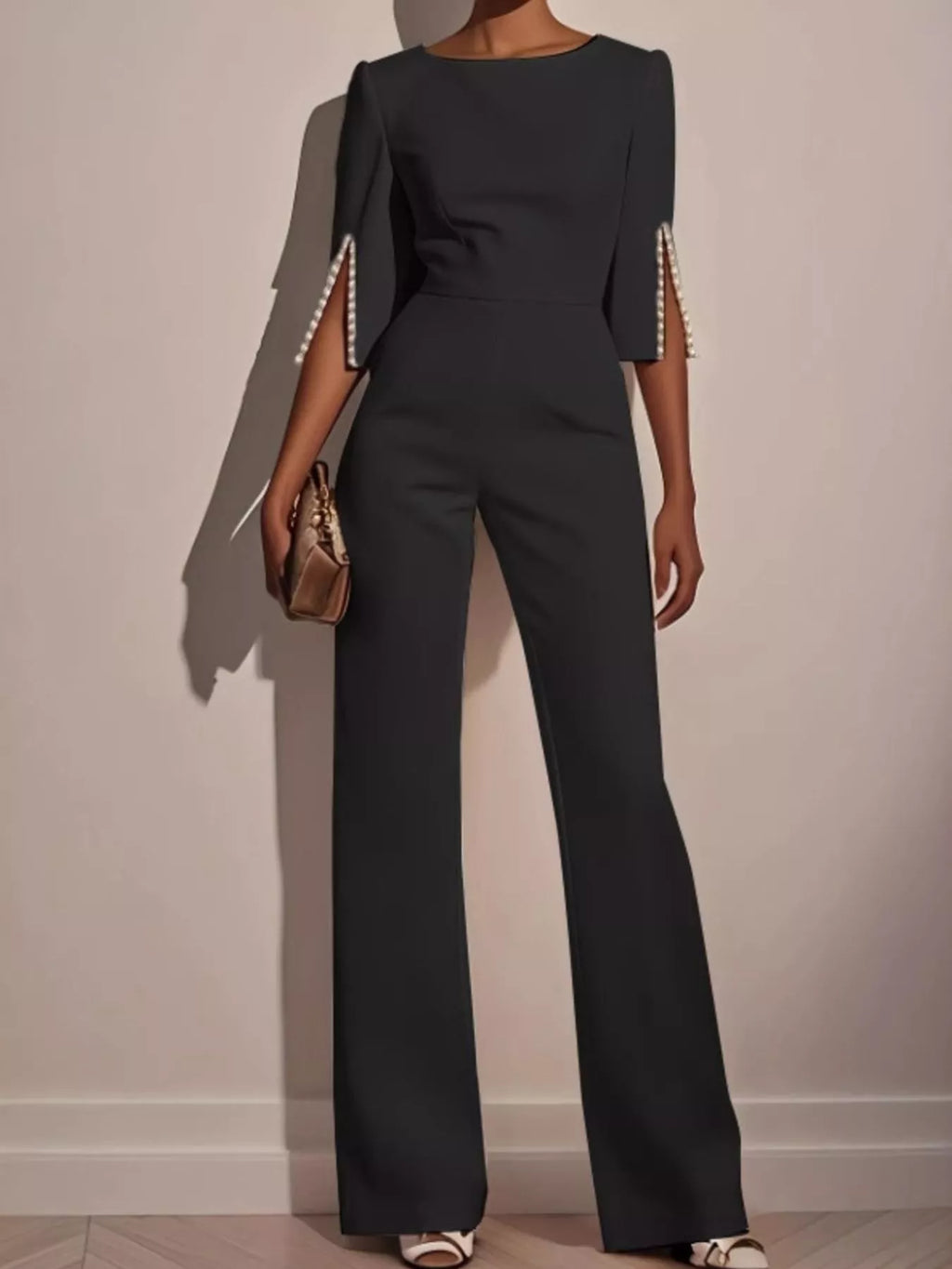 Trendsi wide-leg jumpsuit with slit sleeves, featuring a flowing silhouette and stylish design, shown in the product image.