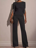 Trendsi wide-leg jumpsuit with slit sleeves, featuring a flowing silhouette and stylish design, shown in the product image.