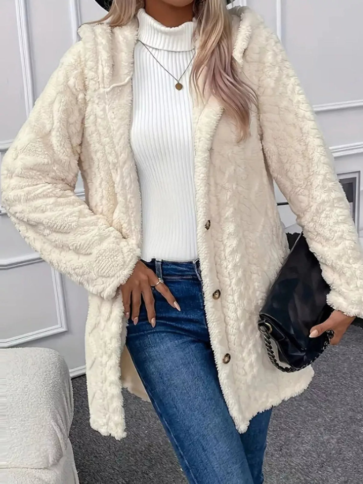 Full size Trendsi cozy cable-knit faux fur hooded outerwear in plus size, featuring a warm, plush faux fur collar and cable-knit design.