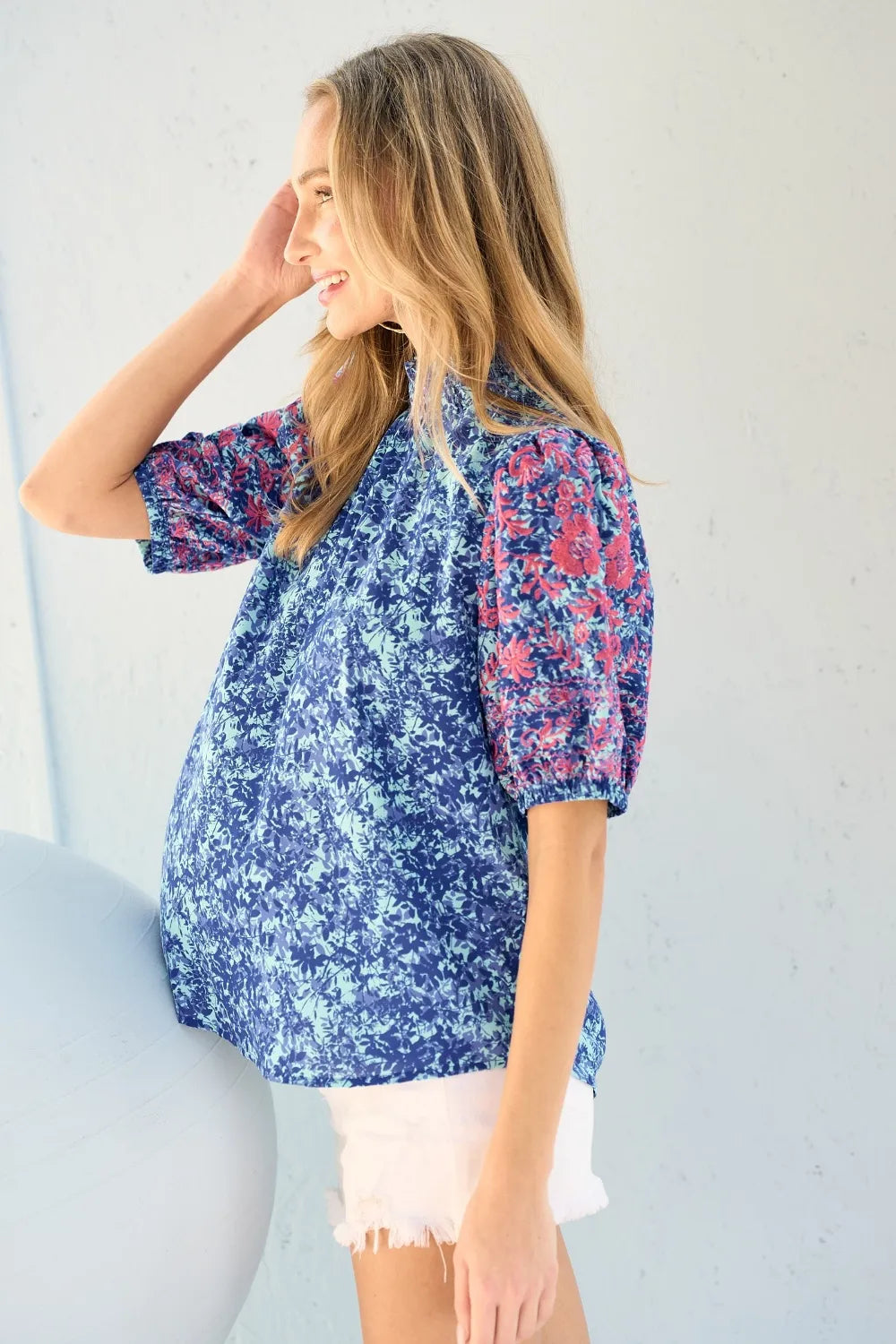 Embroidered puff sleeve printed blouse from Hailey & Co by Trendsi, featuring colorful floral embroidery and lightweight fabric.