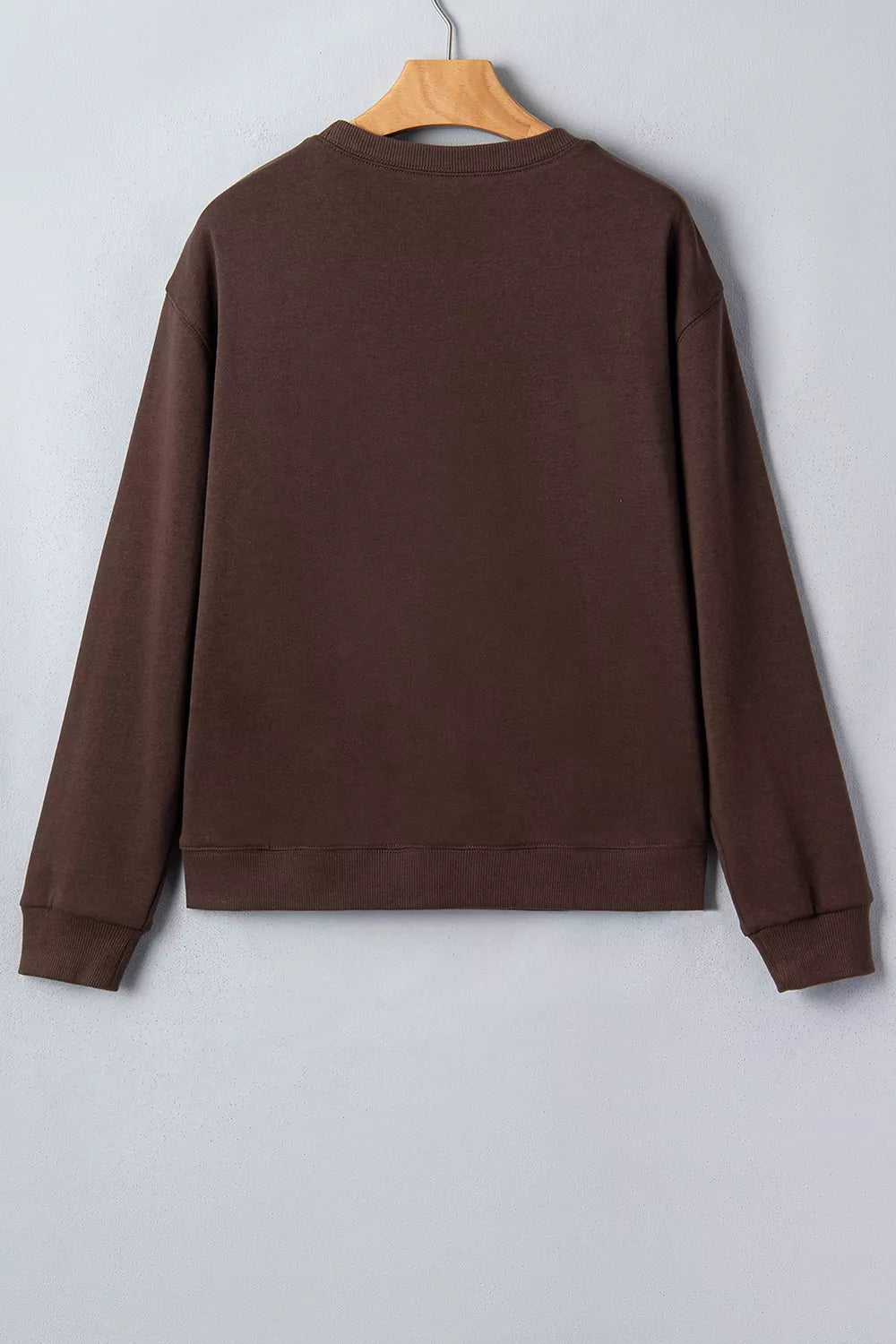 Dark brown crewneck sweatshirt with plaid PRAY graphic, view 10