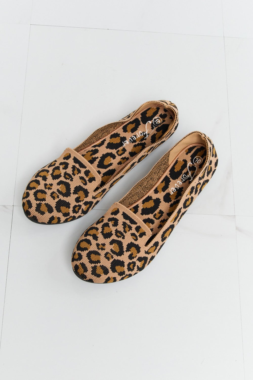 Leopard print Forever Link flats by Trendsi featuring pointed toes and slim soles, perfect for casual or dressy outfits.