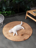 Round braided pet mat by Trendsi featuring a soft, woven design ideal for pets to rest comfortably.