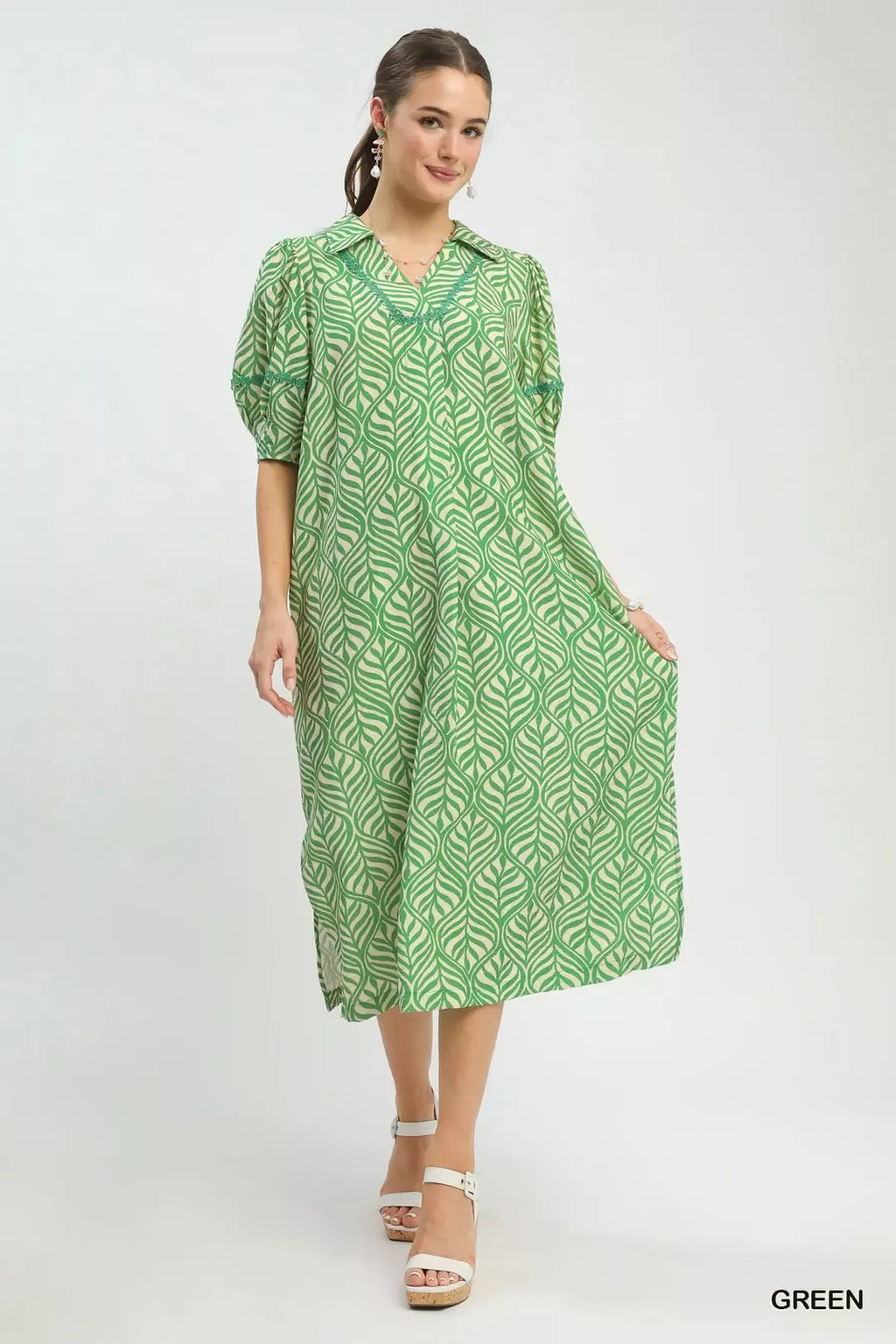 Printed puff sleeve midi dress with pockets by Umgee, featuring a floral pattern and stylish design.