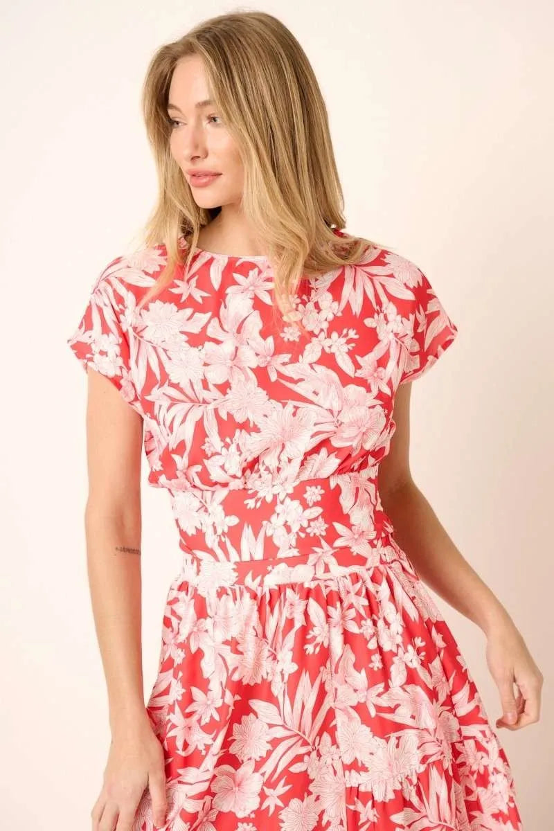 Tropical print top and skirt set by Trendsi, featuring vibrant patterns and lightweight fabric for a stylish, summery look.