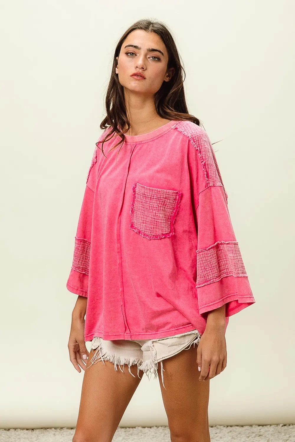 BiBi High-Low Washed T-Shirt by Trendsi, featuring a casual, oversized fit with a distressed washed denim look.