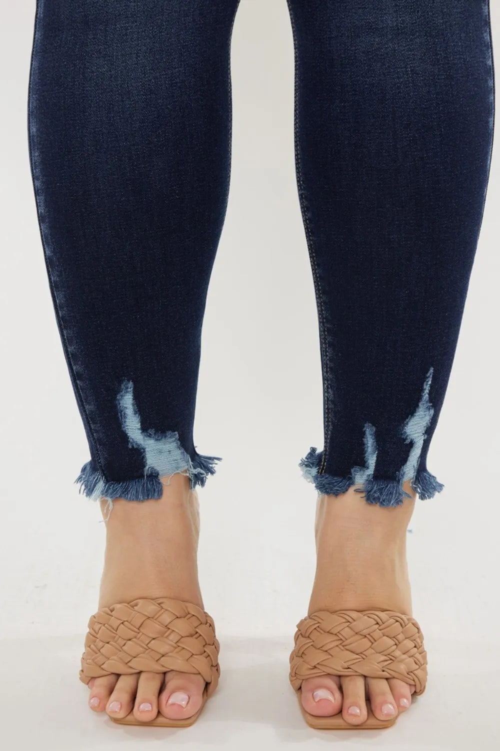 Kancan high waist jeans with raw hem and whisker details, featuring a full size fit and trendy style from Trendsi.