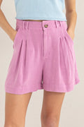 High waist linen shorts with pleats from HYFVE, featuring a relaxed fit and light fabric perfect for warm weather.