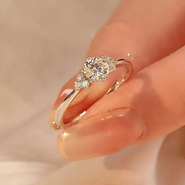 Sterling silver ring with a 1-carat moissanite gemstone, featuring a sleek and elegant design.