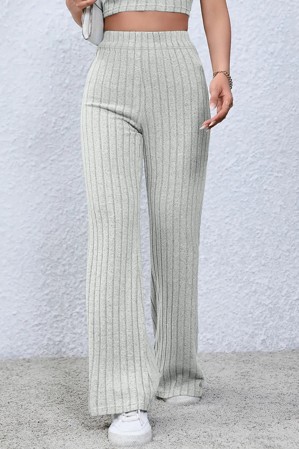 High waist ribbed flare pants by Trendsi featuring a full size fit and a stylish, fitted ribbed design.
