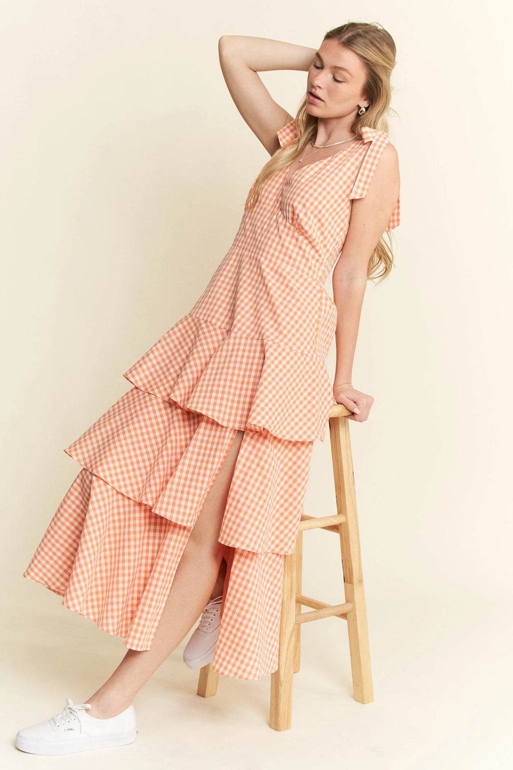 Jade by Jane sleeveless gingham print tiered midi dress in blue and white, perfect for summer, shown on a model.