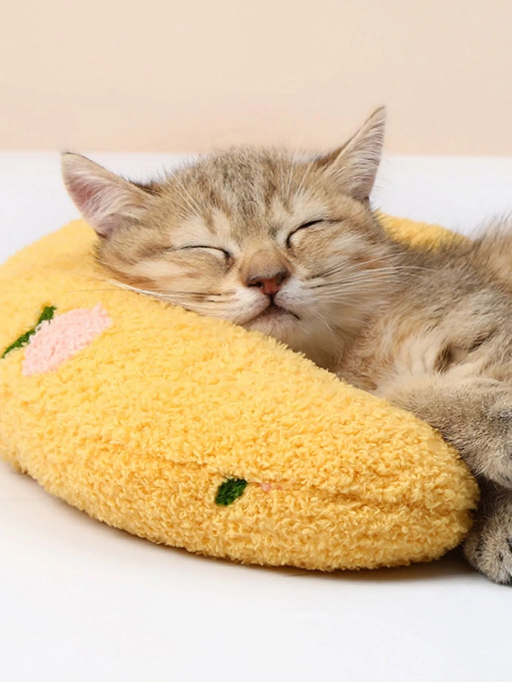 U-shaped pet nest by Trendsi, cozy and soft pet bed with raised edges for comfort and security, shown in a neutral color.