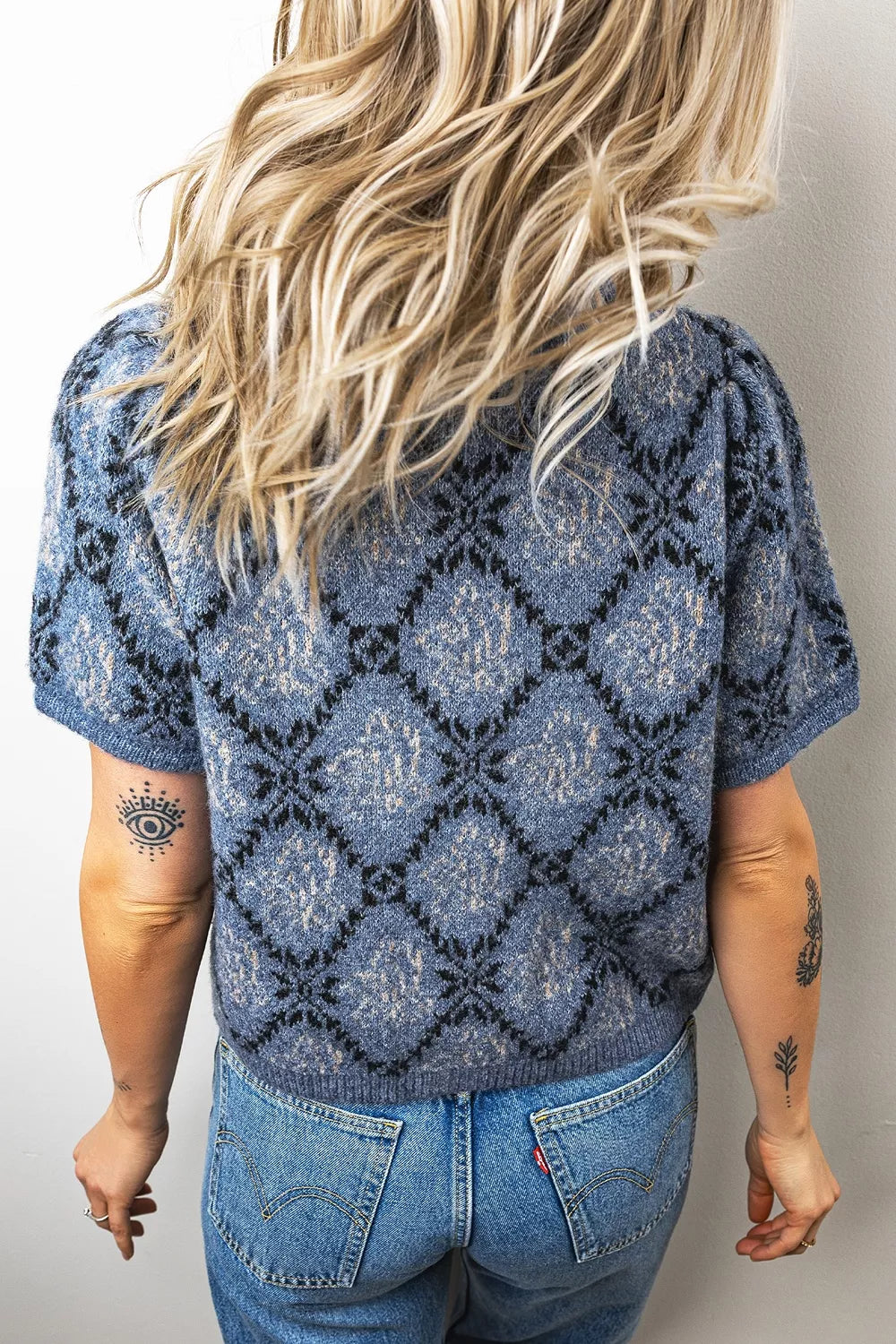 Boho knit cardigan with short sleeves and button front, trendy casual top by Trendsi, perfect for layered boho style outfits.