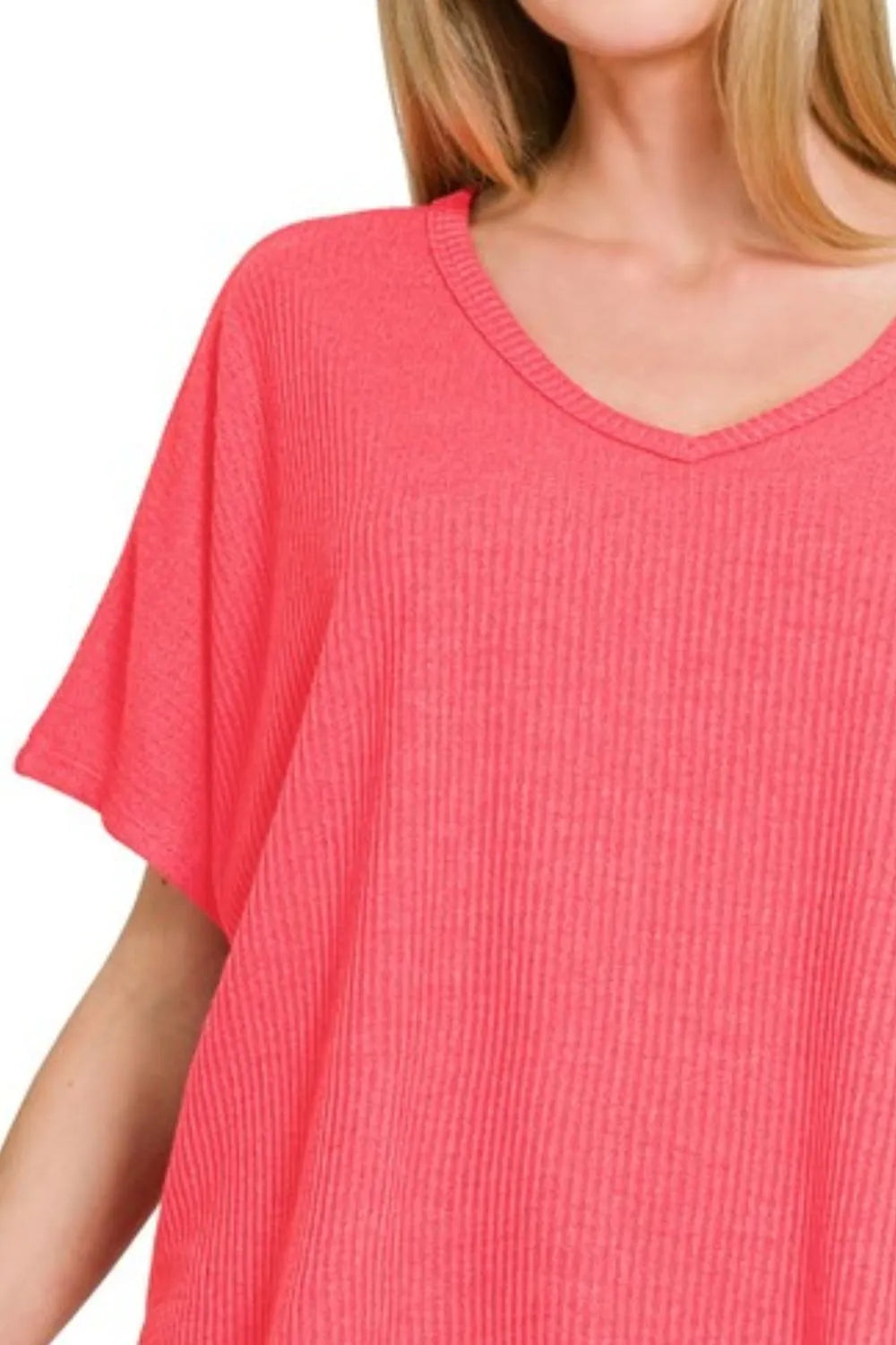 Ribbed V-neck short-sleeve knit top by Trendsi, featuring a fitted design and textured fabric, in a neutral color.