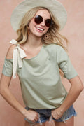 Trendsi BiBi tied ribbon one-shoulder short sleeve T-shirt with a stylish design and fitted silhouette, shown in black.