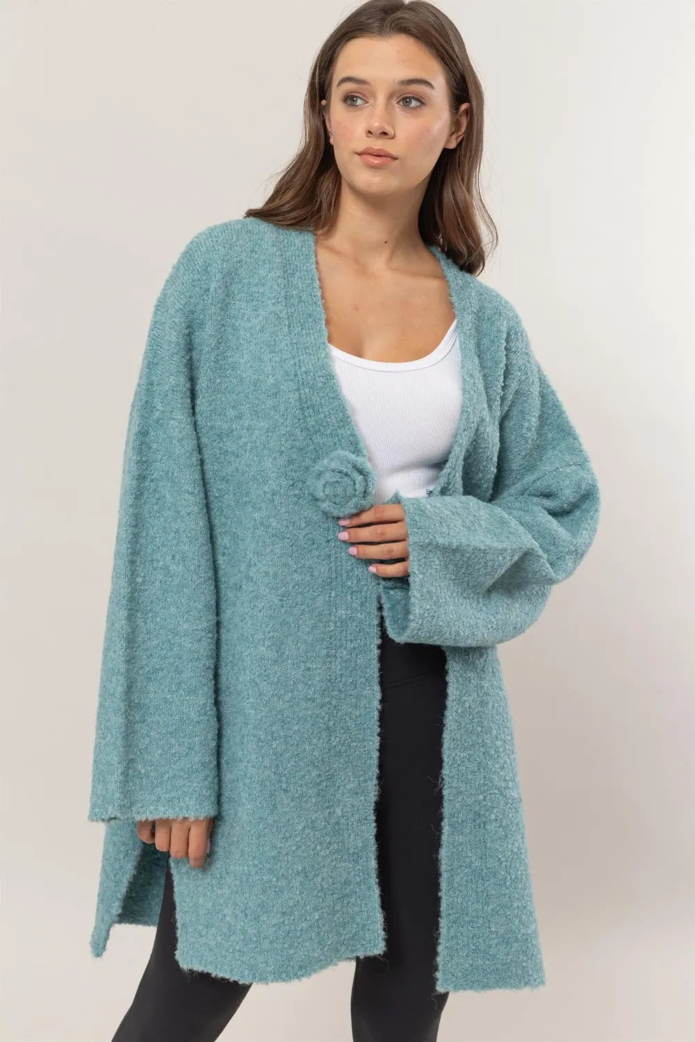 Ocean blue longline sweater cardigan with front rosette