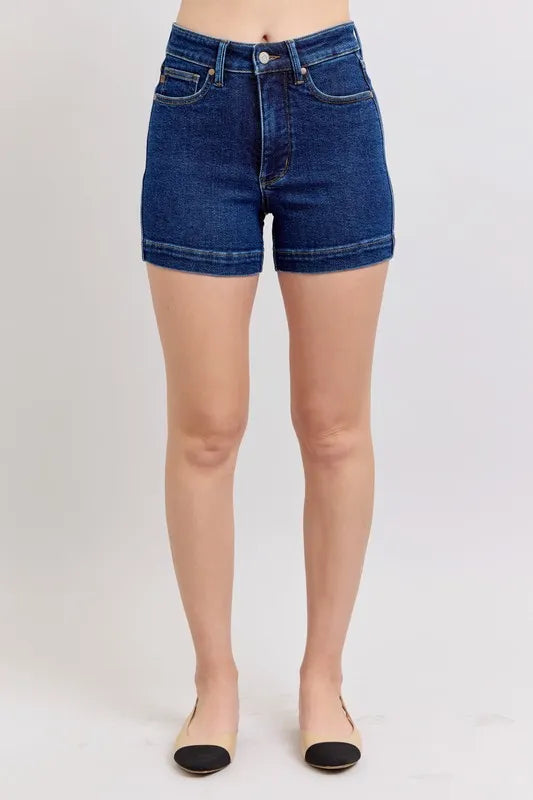 Plus size Judy Blue high waist denim shorts with tummy control, featuring full-length cut and trendy fit in a stylish design.