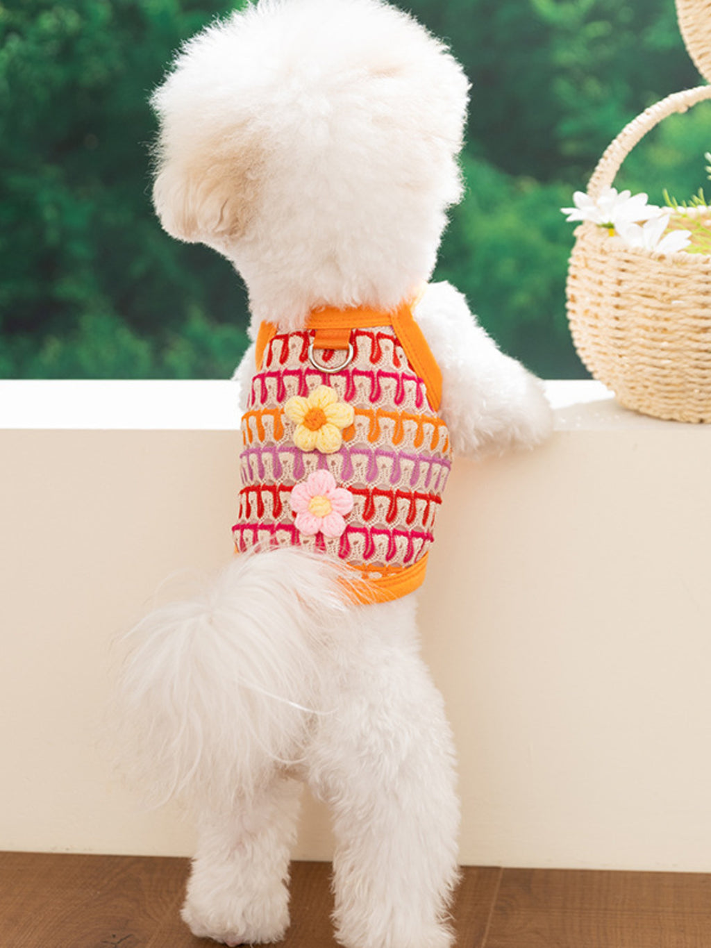 Bright floral breathable pet top from Trendsi featuring lightweight fabric and colorful flower print for comfortable pet wear.