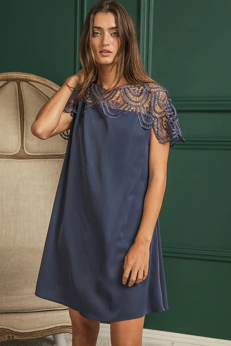 BiBi crochet lace yoke detailed wrinkled dress with intricate lace design and flowing fabric, by Trendsi.