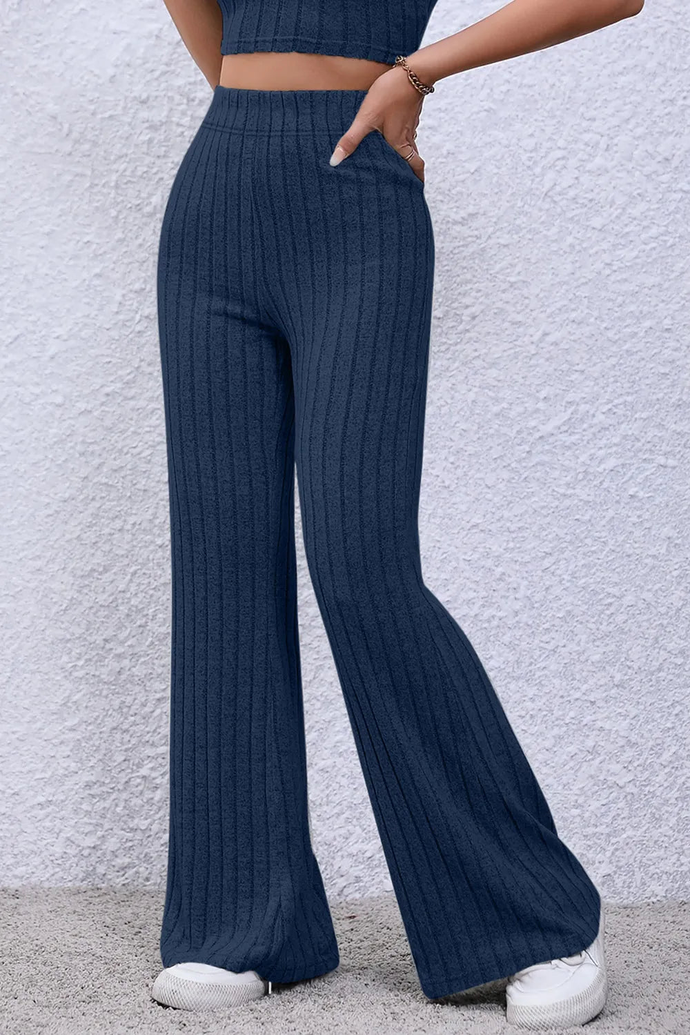Full view of Basic Bae ribbed high waist flare pants in a full size, showing the fitted waistband and wide leg flared design.