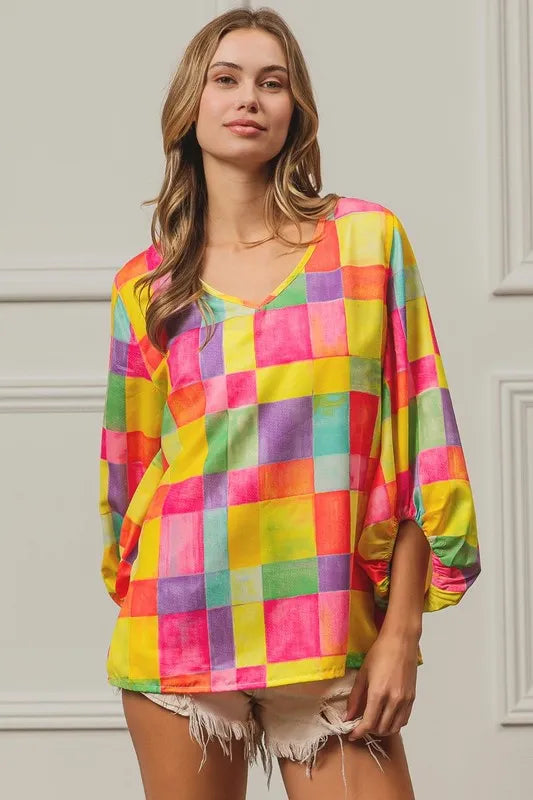 Colorful BiBi Multi Block Bubble Pop Balloon Top by Trendsi featuring vibrant, playful bubble design and multiple bright blocks.