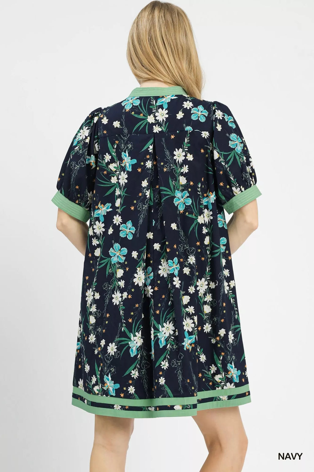 Umgee floral puff sleeve dress with contrast trim, featuring a feminine design and vibrant floral pattern.