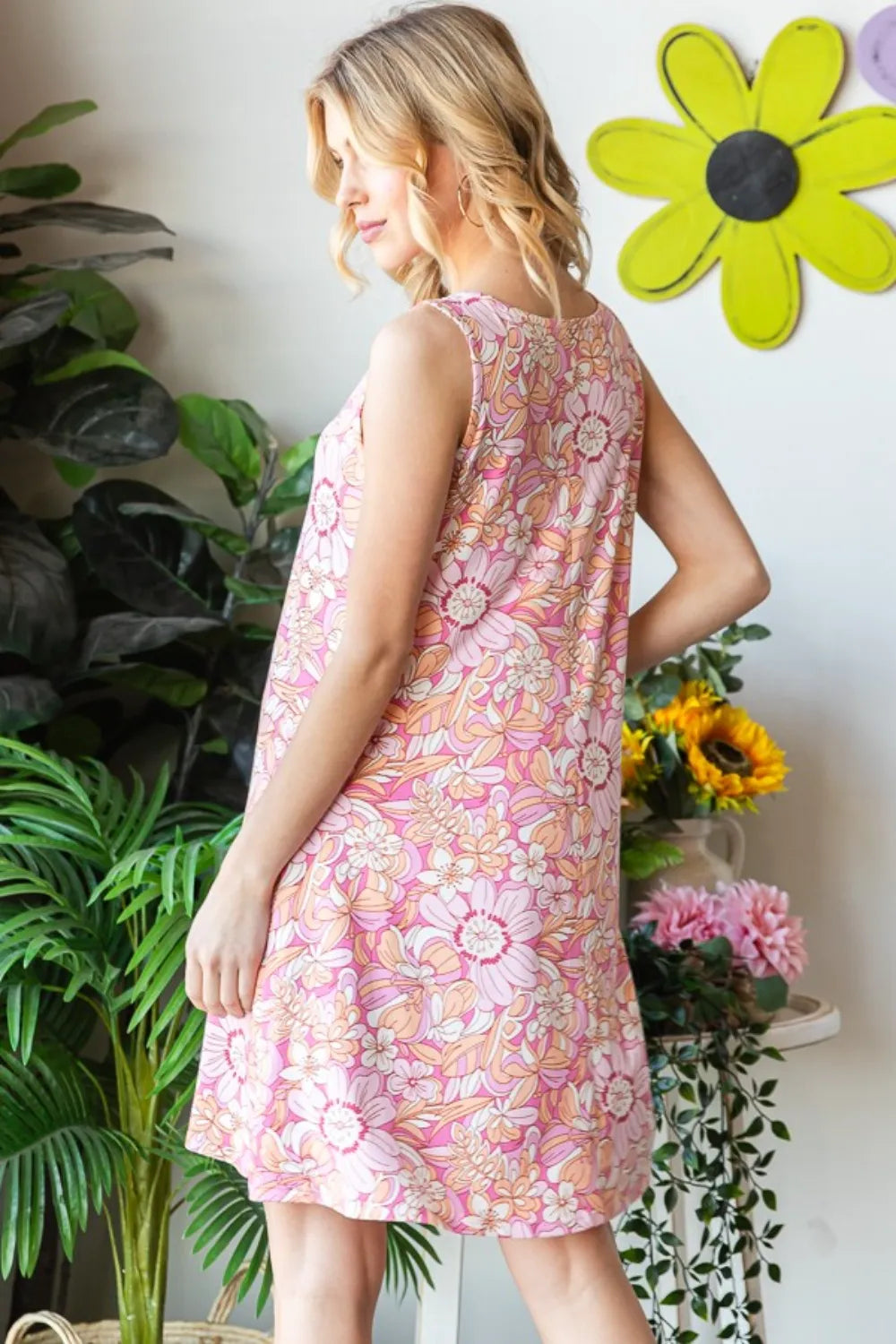 Heimish floral v-neck tank dress with pockets, full size, featuring a vibrant floral pattern and sleeveless design.