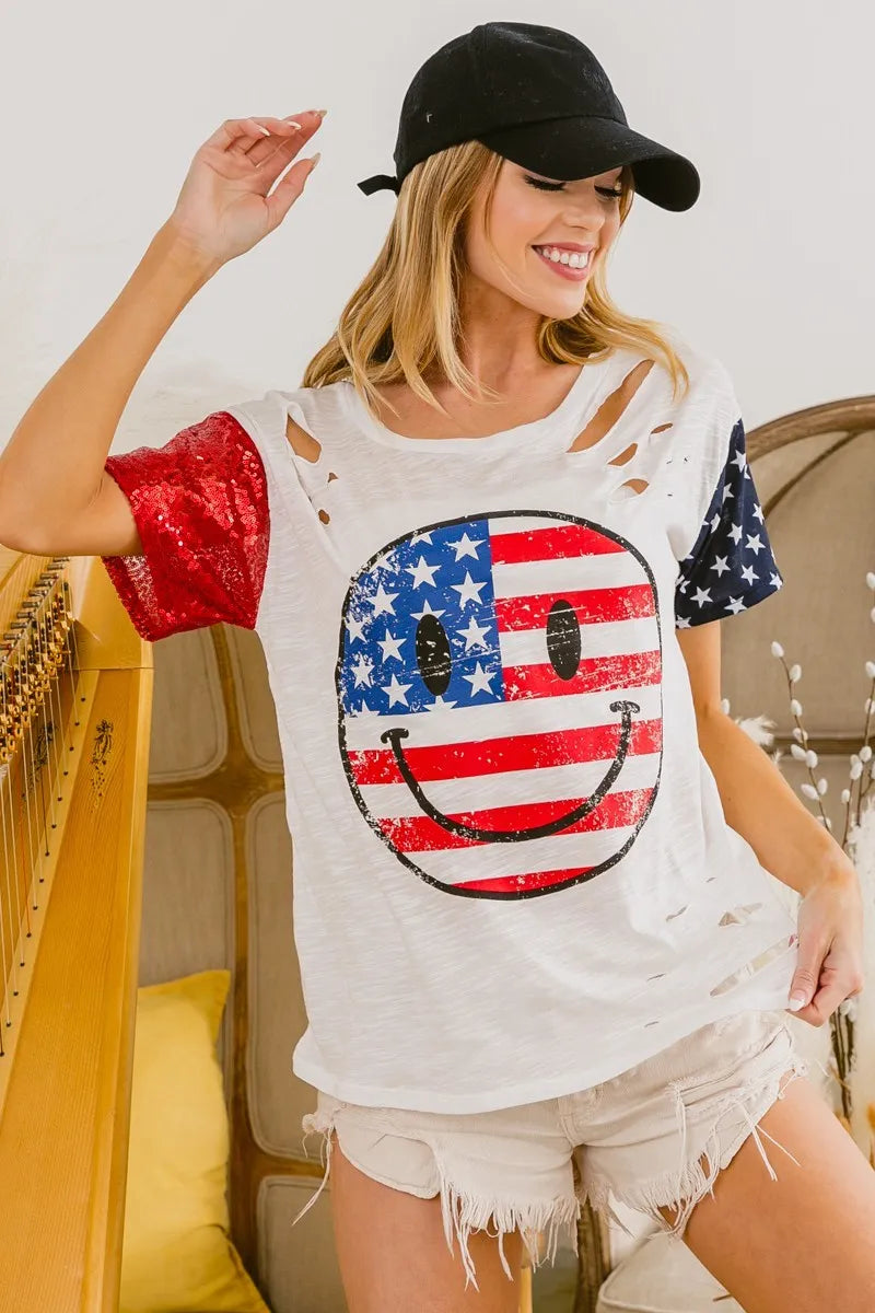 Trendsi BiBi Fourth of July top with laser-cut smile face design, festive red, white, and blue sleeveless shirt.