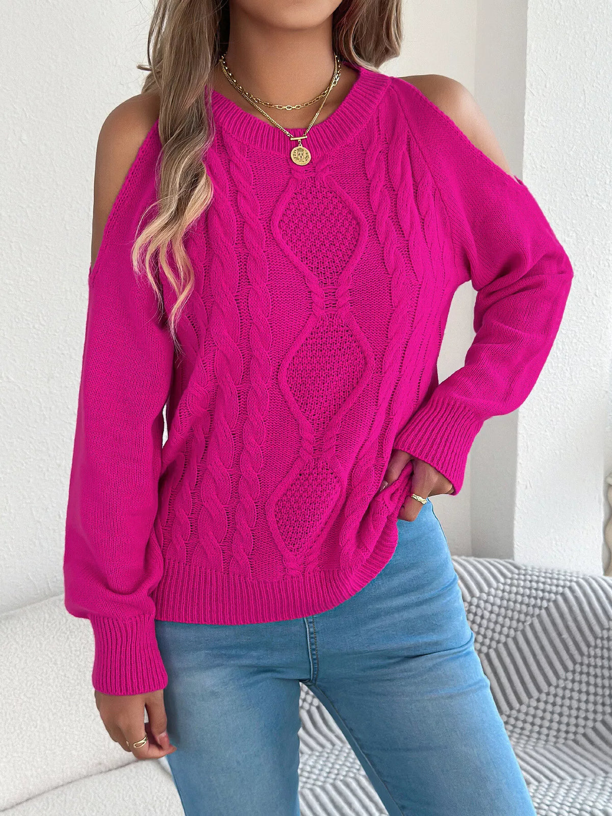 Cold shoulder cable knit sweater
