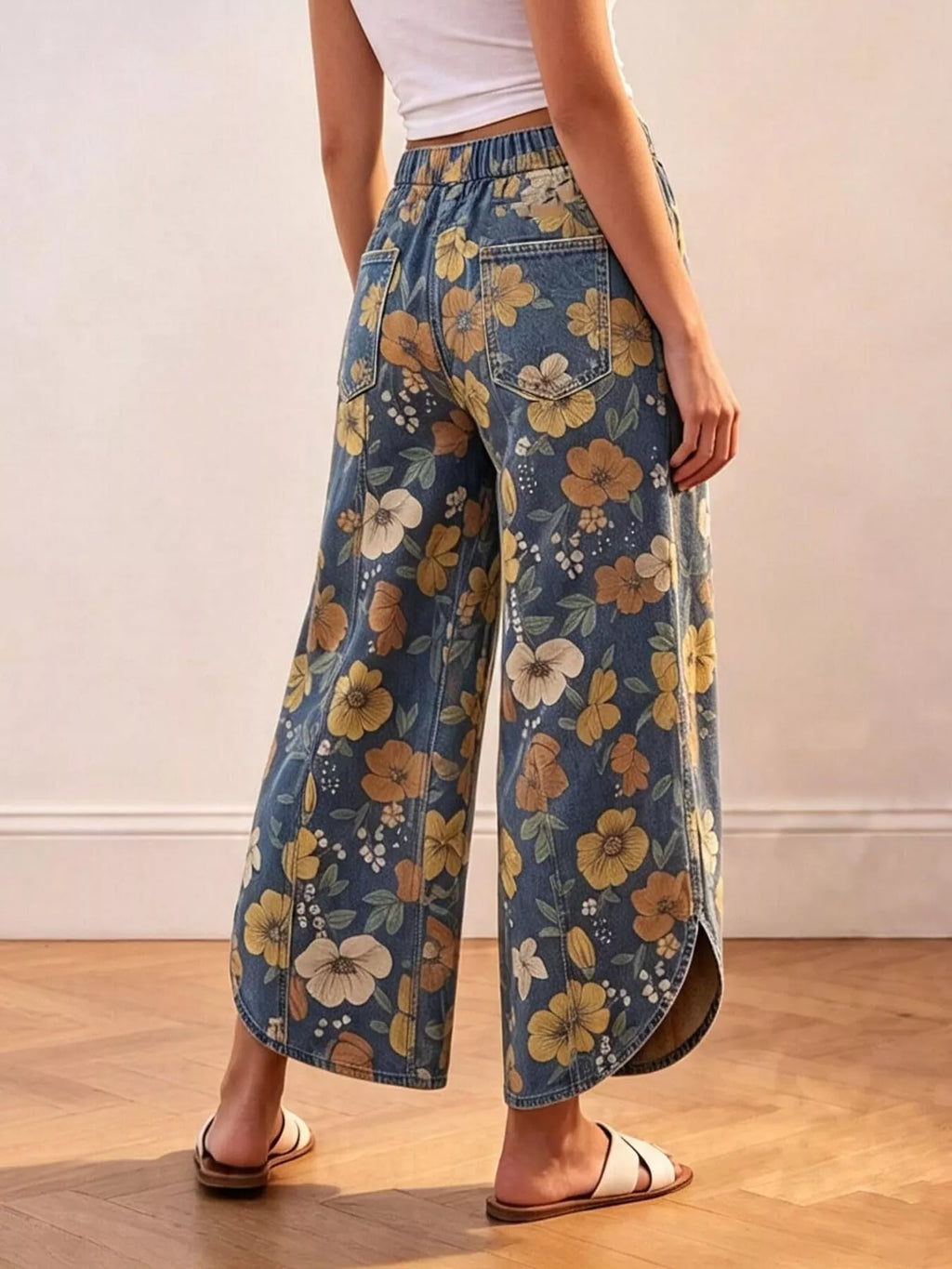 Floral print elastic waist wide-leg jeans from Trendsi with a relaxed fit and vibrant floral pattern, stylish and comfortable.