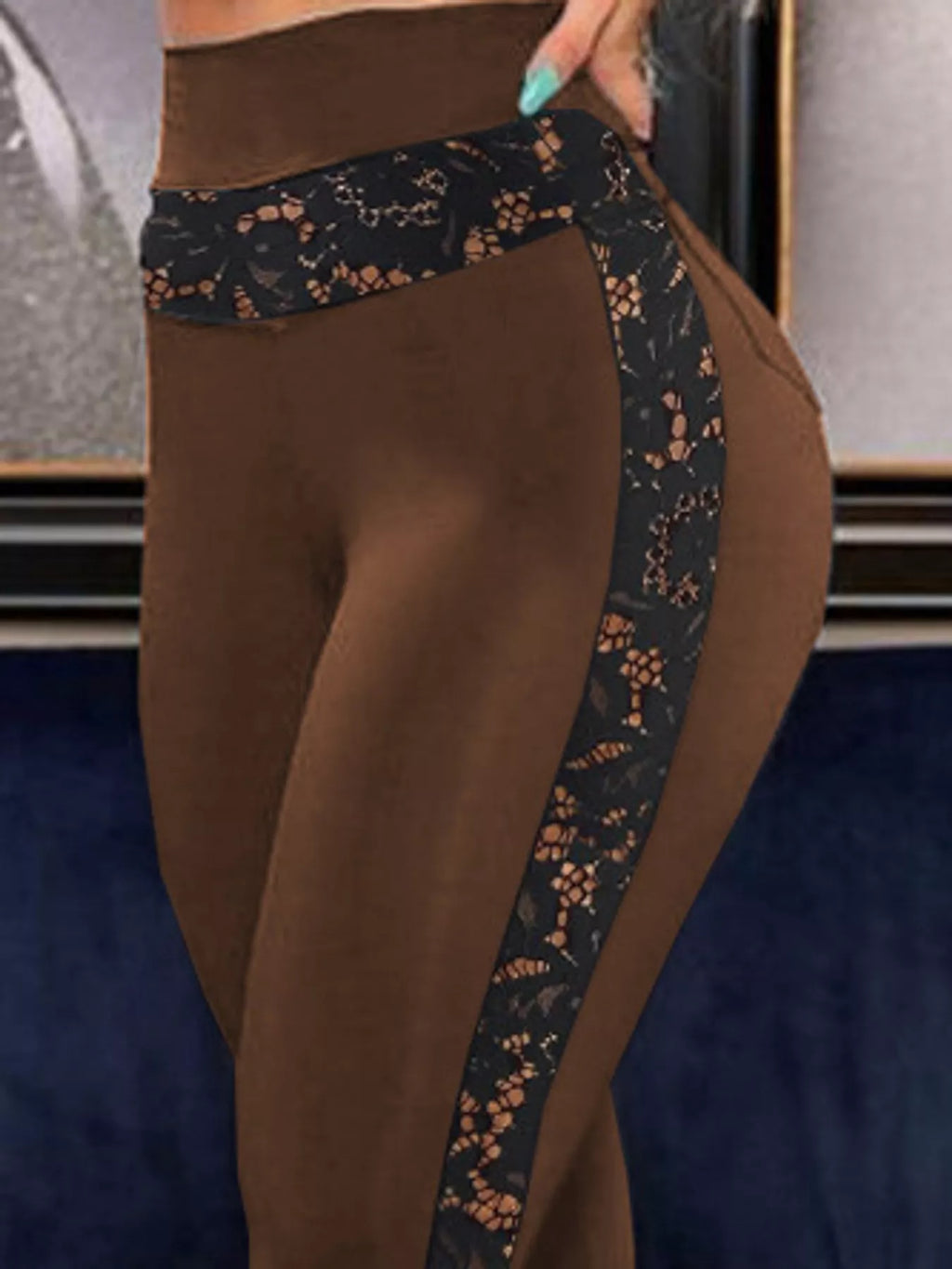 Full size high-waisted floral lace-trimmed slimming leggings by Trendsi, featuring a comfortable fit and floral lace details.