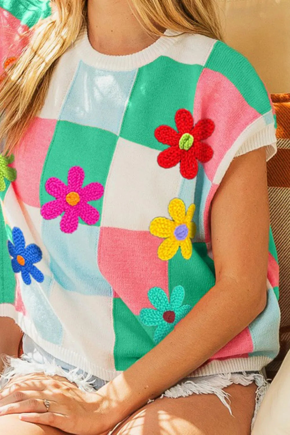 Trendsi BiBi Flower Patch checkered sweater vest with floral embroidery, featuring a cozy knit fabric and classic checkered pattern.