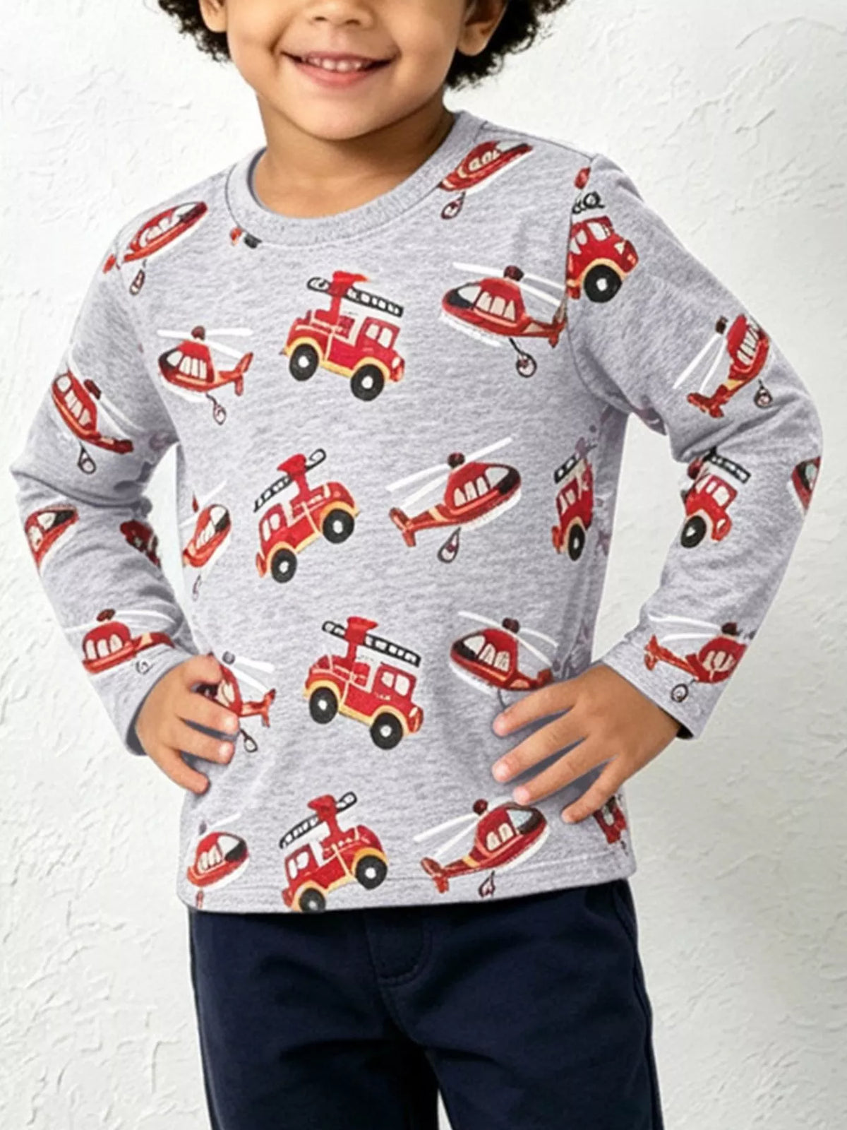 Children's fire truck and helicopter print long sleeve crew neck T-shirt by Trendsi, featuring colorful vehicle illustrations for kids.