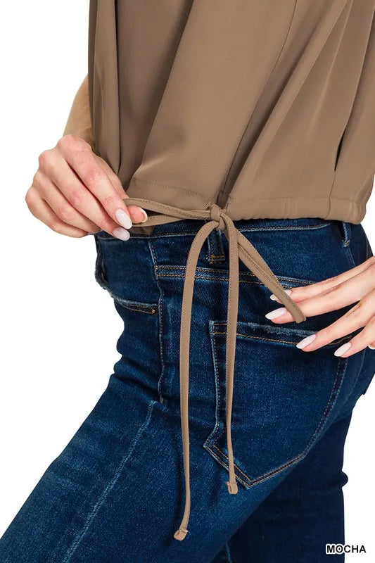 Woven sleeveless tie side top by Zenana featuring a drawstring, perfect for casual summer outfits.