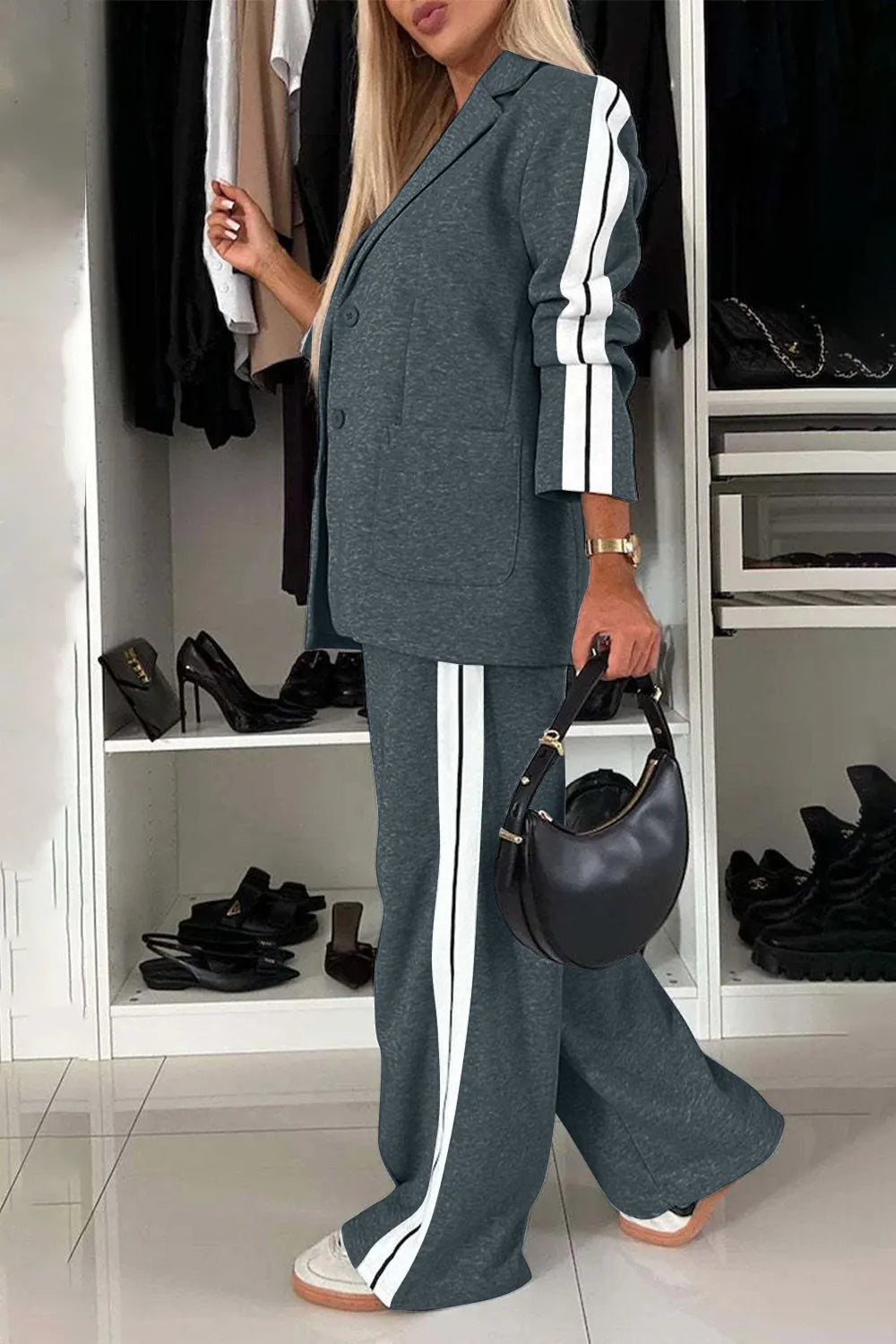 Full size contrast lapel collar top and pants set from Trendsi, featuring a stylish coordinated outfit with a lapel collar design.