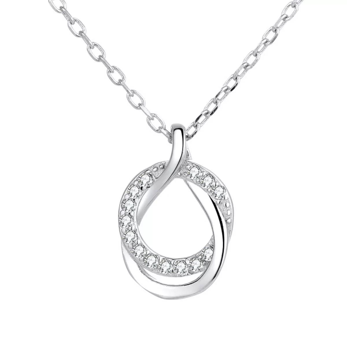 Sterling silver zircon pendant necklace featuring a sparkling gemstone, stylish jewelry piece with a delicate chain.