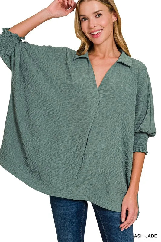 Zenana airflow collar tee with smocked sleeve band, casual top featuring a relaxed fit and breathable fabric, trendy and comfortable.