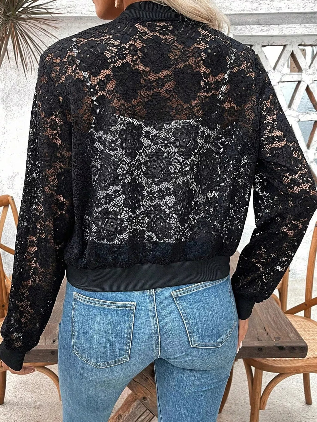 Sheer lace zip-up jacket from Trendsi featuring intricate lace fabric and a front zipper closure.