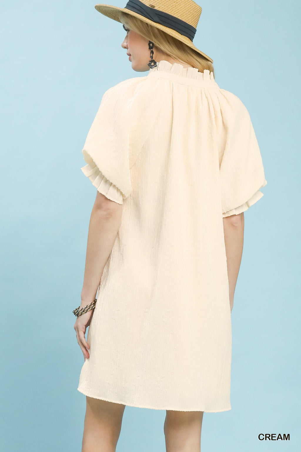 Linen blend ruffle dress by Trendsi, featuring a flowy silhouette with ruffle details and a stylish, casual design.