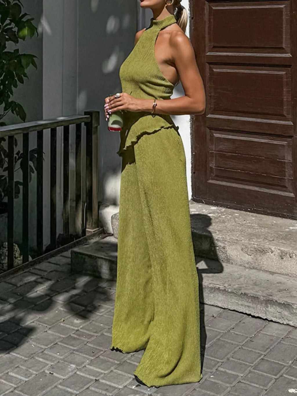 Trendsi sleeveless top and wide-leg pants two-piece set, lightweight fabric, stylish casual outfit, neutral color, front view.