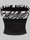 Zebra print faux fur trimmed tube top by Trendsi, featuring black and white zebra pattern with soft faux fur accents.