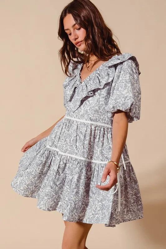 Printed cotton ruffle V-neckline dress with side tie detail, stylish women's fashion from Trendsi.