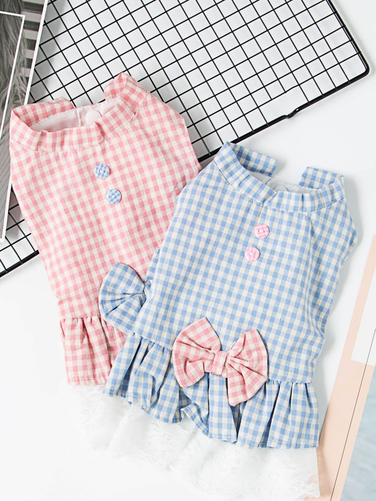 Gingham ruffle lace pet dress by Trendsi, featuring a cute plaid pattern, ruffled neckline, and delicate lace details for small dogs.