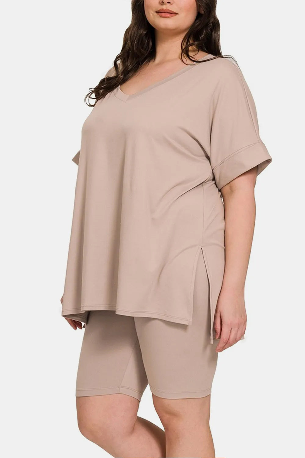 Zenana full-size V-neck short sleeve T-shirt and shorts set by Trendsi, featuring a relaxed fit and slit design in soft fabric.