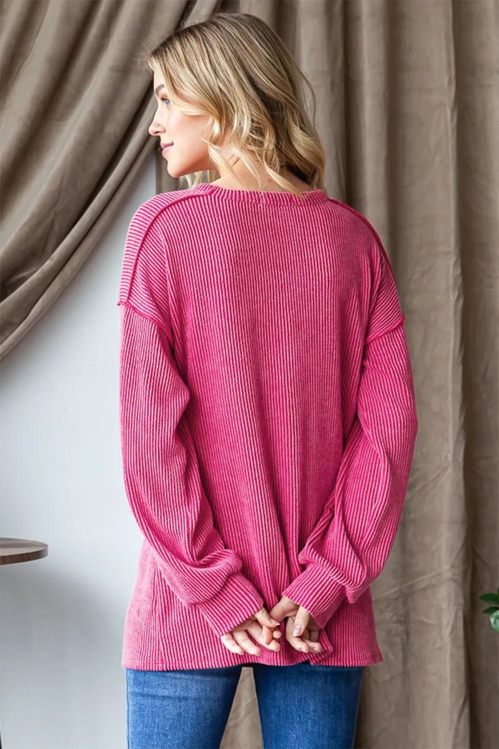 Heimish ribbed long sleeve T-shirt with exposed seams, featuring a fitted design and textured knit fabric.