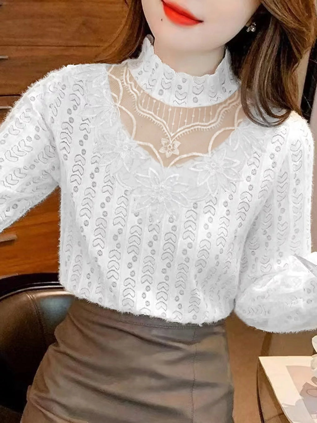 Plus size elegant mock neck lace blouse with sheer floral detailing, designed by Trendsi, showcasing intricate lace and sheer fabric.