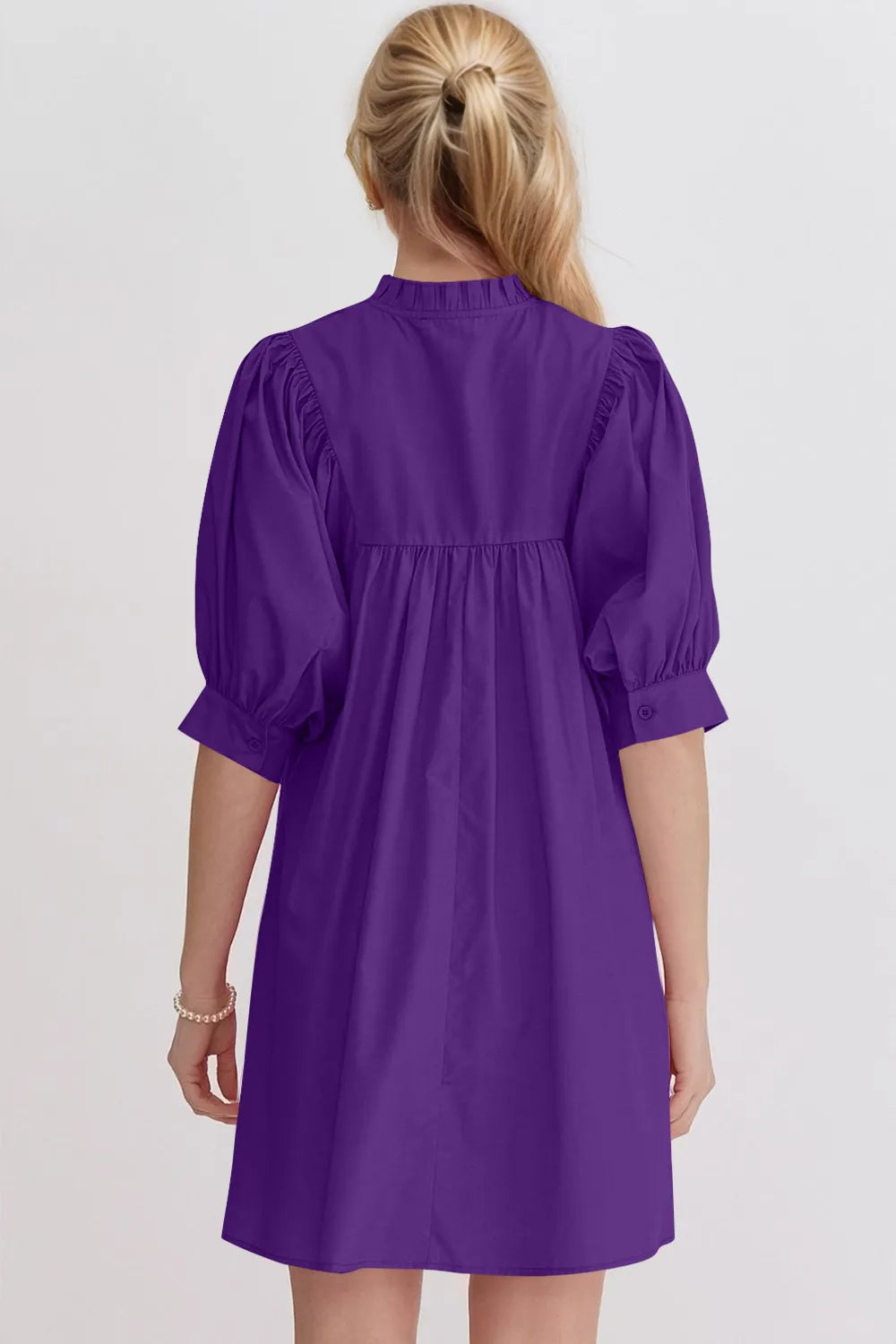 Pink notched puff sleeve babydoll mini dress by Trendsi featuring ruffled accents and a flattering fit.